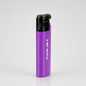 A purple Torjet lighter with a black top cap, standing upright on a light gray reflective surface.