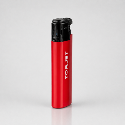 A TorJet portable torch lighter with a metallic red body and a black top ignition cap, standing upright on a light gray reflective surface.