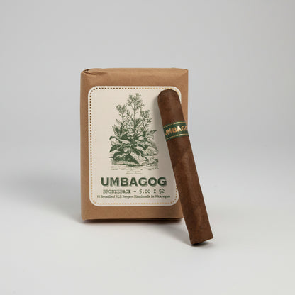 Cigar with 'Umbagog' branding and packaging on a white background