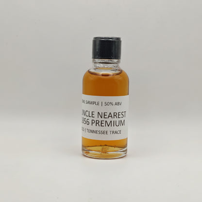 Small bottle of Uncle Nearest 1856 Premium bourbon on a white background