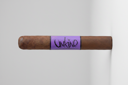 Cigar with 'Unkind' branding on a purple band