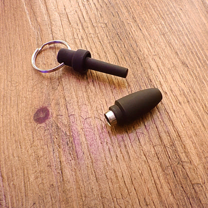 Cigar Piercer on a wooden surface