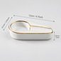 White ceramic double-compartment dish with gold trim, shown on a light gray background with dimension lines and text indicating measurements of 12cm by 6.5cm.