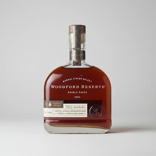 Woodford Reserve Double Oaked bourbon whiskey bottle on a white background