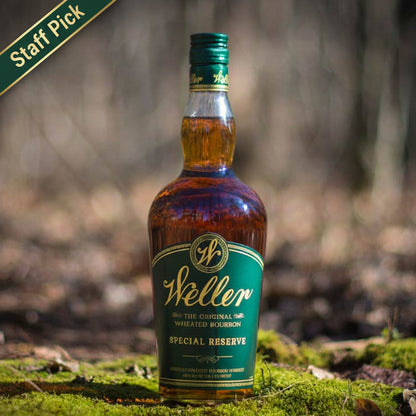 Bottle of Steller Special Reserve whiskey in a forest setting