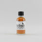 Small bottle of Wild Turkey bourbon on a bar counter with a blurred bar background