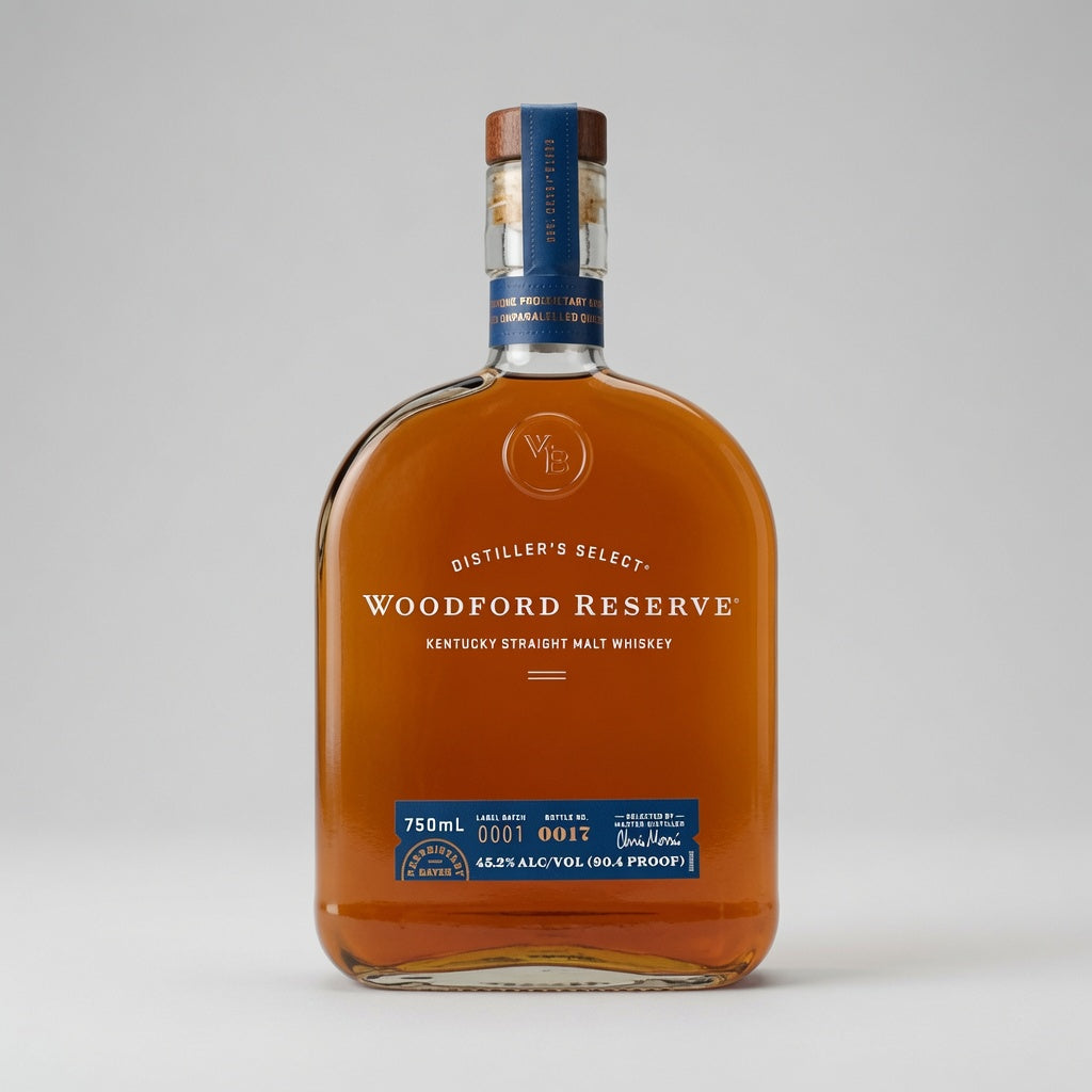 A bottle of Woodford Reserve Distiller's Select Kentucky Straight Malt Whiskey, 750ml, showing the amber liquid through a clear glass bottle with blue and white labels and a brown cap, set against a neutral gray background.