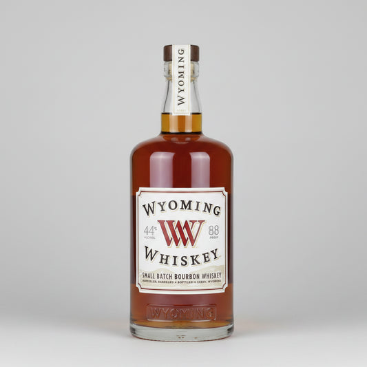 A bottle of Wyoming Whiskey 88-proof bourbon whiskey on a plain white background.