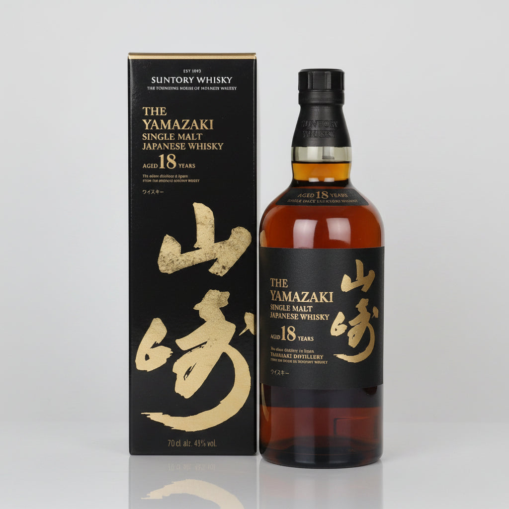 A bottle of Suntory Whisky The Yamazaki Single Malt Japanese Whisky 18 Years next to its black and gold packaging box, set against a plain white background.