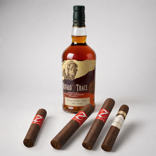 A bottle of Buffalo Trace Kentucky Straight Bourbon Whiskey stands behind four cigars on a light gray studio background. The bottle has amber liquid, a dark cap, and a label with a buffalo illustration and Buffalo Trace branding.