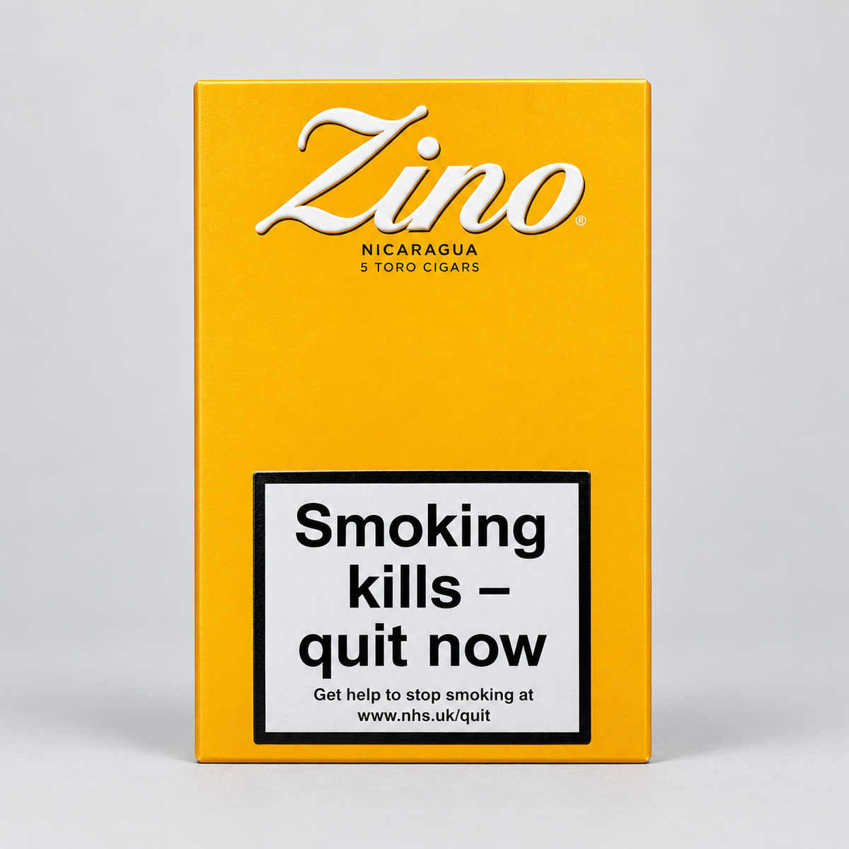 A yellow pack of Zino Nicaragua 5 Toro Cigars on a light gray background. The pack features a prominent white warning label that reads 'Smoking kills - quit now' with the NHS website below it.