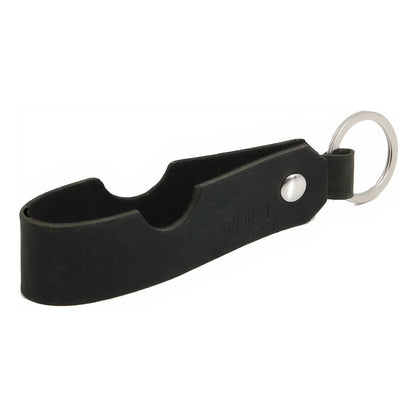 Black leather cigar rest with a key ring on a white background