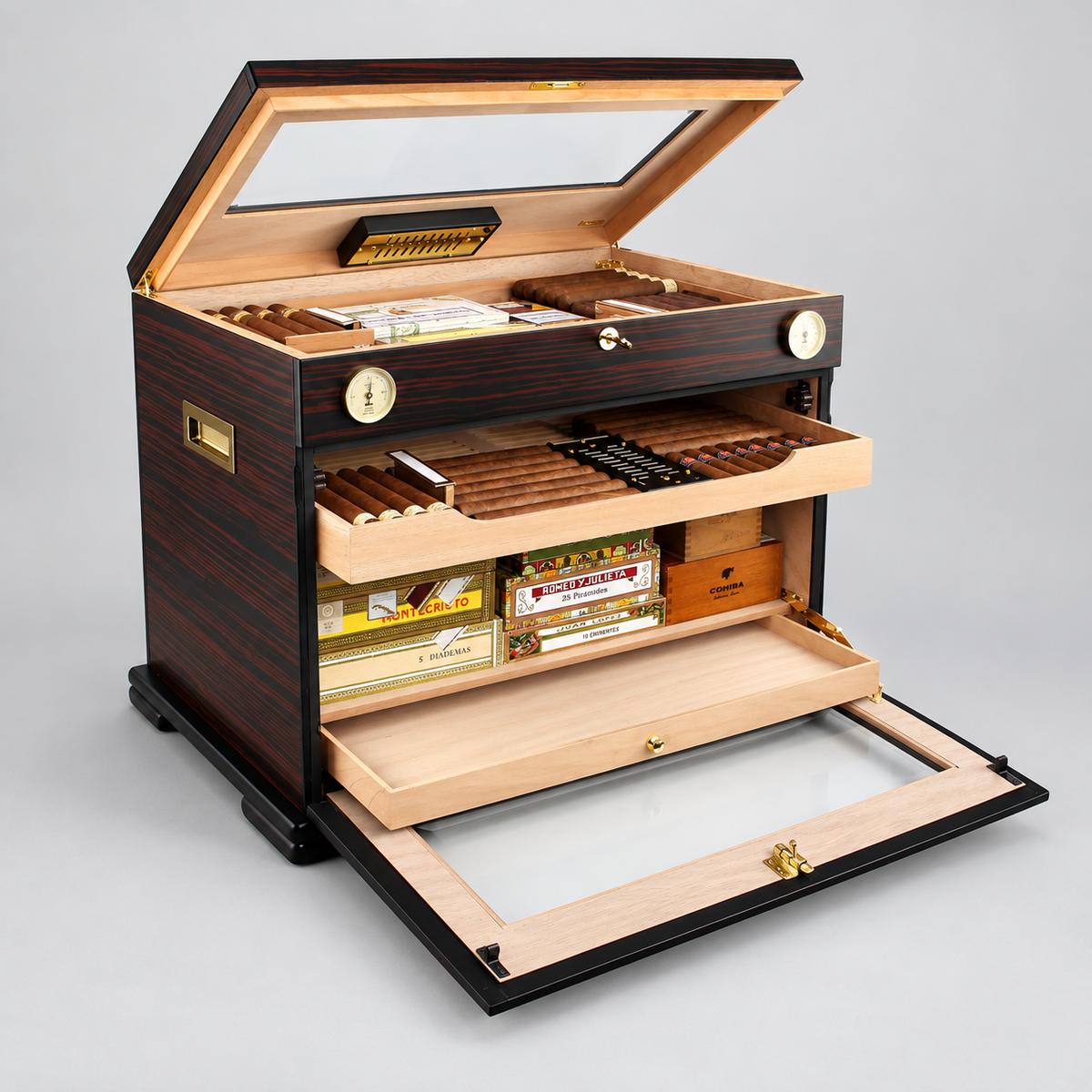 A premium cigar humidor case with a dark wood grain exterior, light natural wood interior, and open compartments displaying cigars, boxes, and accessories, set against a neutral gray background.
