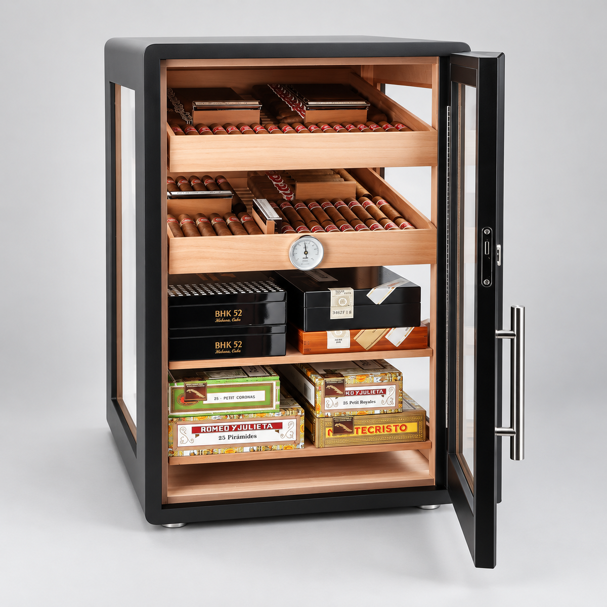 A black humidor cabinet with its door open, displaying multiple wooden shelves stocked with cigar boxes and cigars. The cabinet features a glass door, a silver handle, a hygrometer on the front, and a clean studio background.