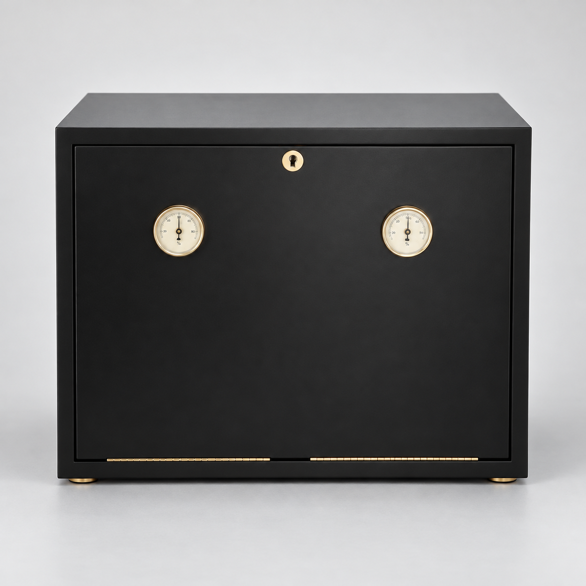 A black wooden humidor safe with two round dials and a small gold lock on the front door, set against a neutral gray background.