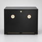 A black wooden humidor safe with two round dials and a small gold lock on the front door, set against a neutral gray background.
