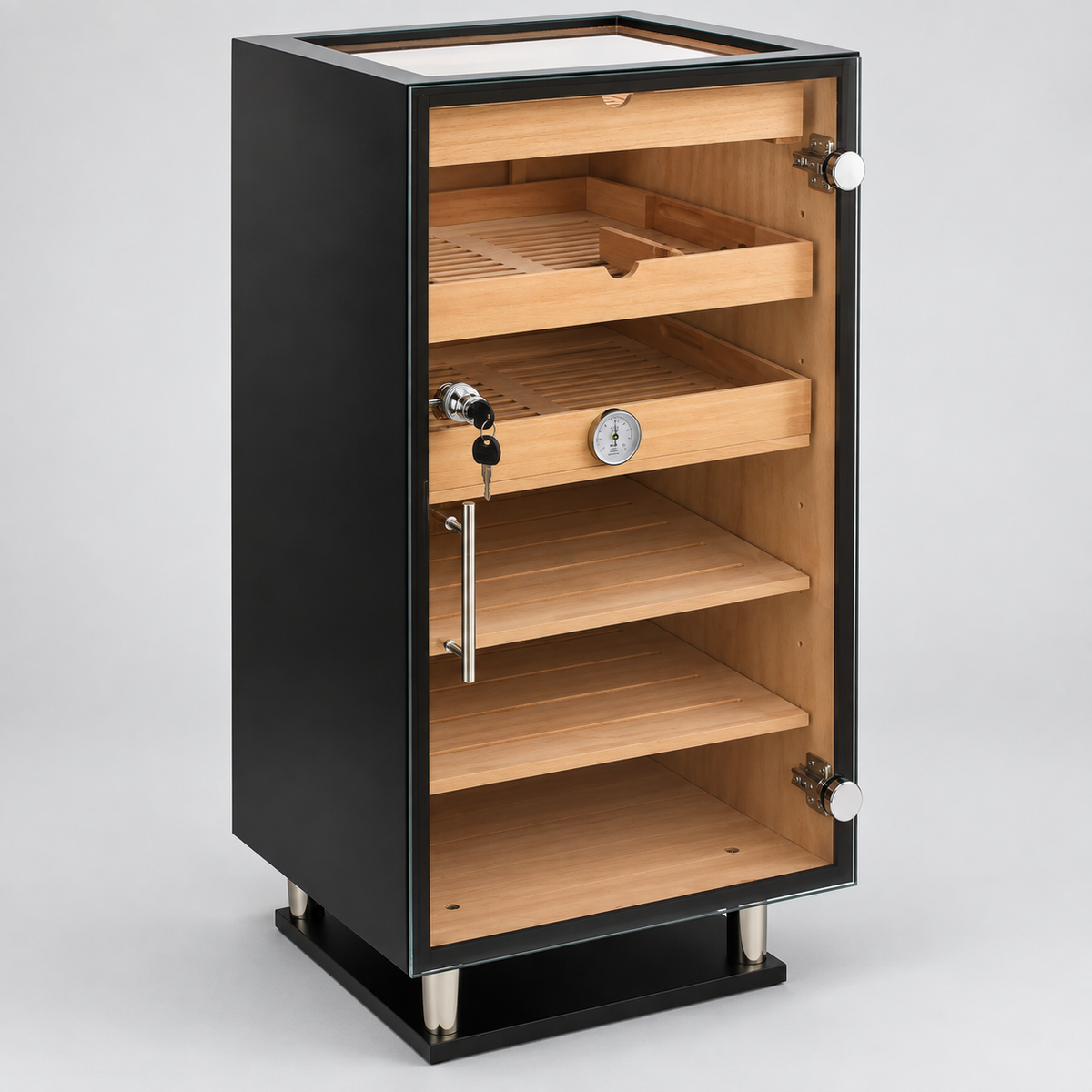 A black and wood humidor cabinet with a glass door, shown open to reveal multiple wooden shelves, a hygrometer, and a lock on the door, set against a light gray studio background.