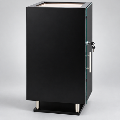 A black display cabinet with a glass door, featuring a silver metal handle, lock with keys, and a black base on a light gray background.