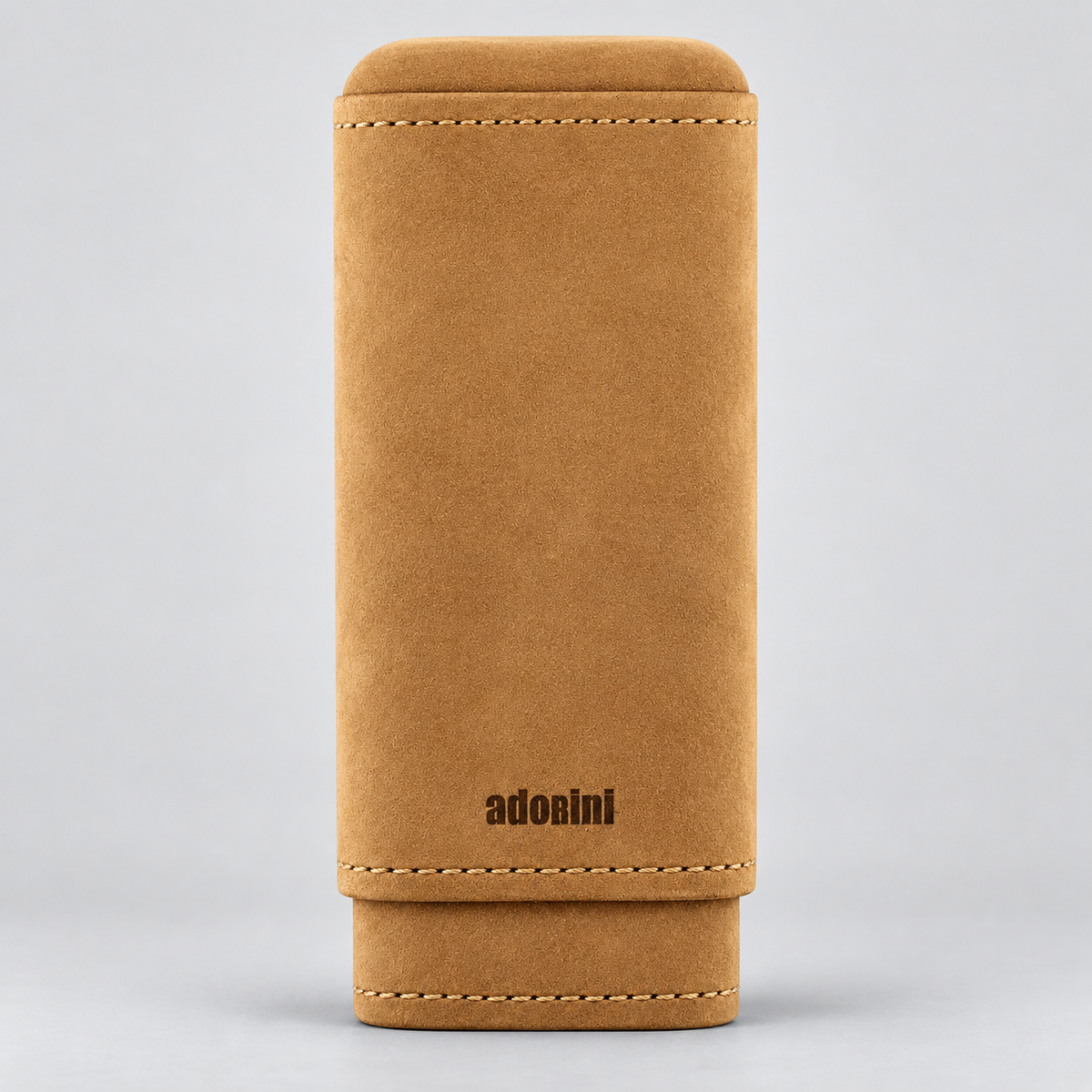 A tan suede or nubuck pouch with a flap closure, featuring contrast stitching and the brand name 'adosini' printed in black near the bottom, set against a neutral gray background.
