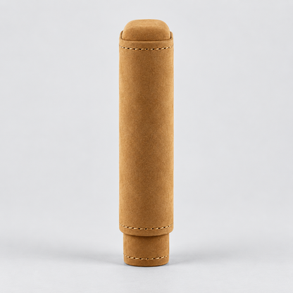 A tan suede or nubuck cylindrical sleeve or cover with stitched details, standing upright on a light gray background.