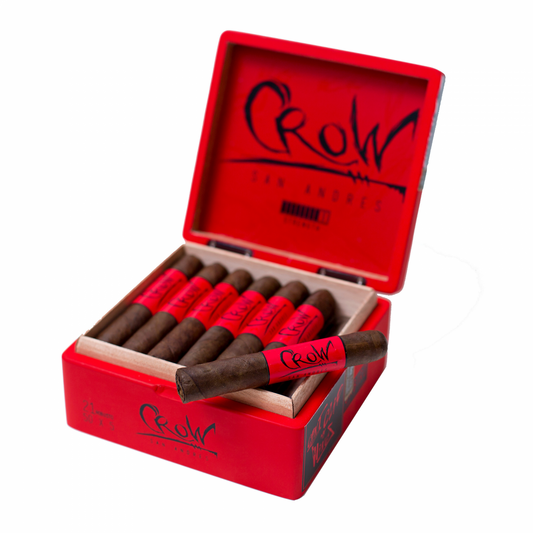Open red C row cigar box with cigars inside on a white background