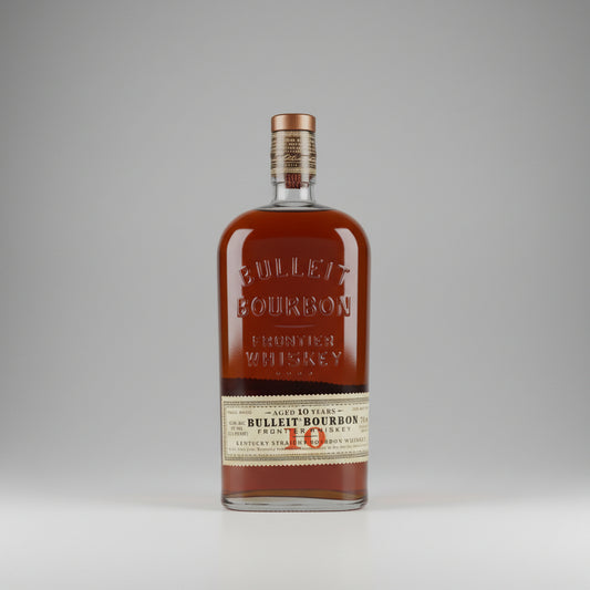 Bulleit Bourbon whiskey bottle on a gray background