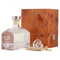 CLIIX bottle with wooden box and glass on a white background