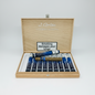 Wooden box of J. Cortes cigars with warning label on a white background