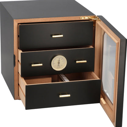Black and wood humidor with glass door on a white background