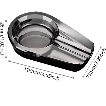 Glass ashtray with dimensions labeled on a white background