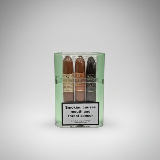 Pack of cigars with warning label on a white background