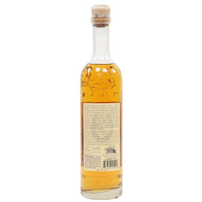 Bottle of alcohol with a cork stopper on a white background