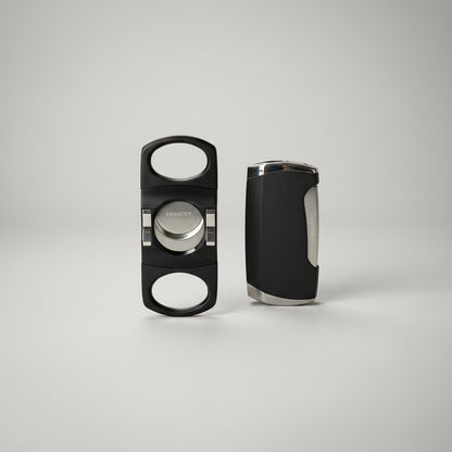 A black cigar cutter and its matching case, both branded HONESTY, displayed on a clean white background.