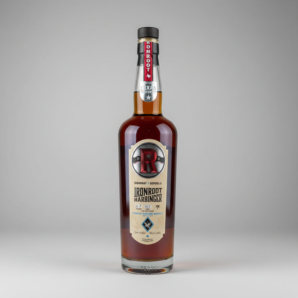 A bottle of Ironroot Harbinger texan whiskey on a white background