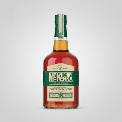 A bottle of Henry McKenna 10 Year Old Bourbon Whiskey on a plain white background. The bottle features a dark green neck label and a cream-colored main label with bold green and gold lettering, showcasing the amber-colored whiskey inside.