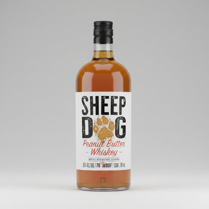 A bottle of Sheep Dog Peanut Butter Whiskey with a white label featuring a dog paw print and bold black and red lettering, filled with amber-colored liquor and topped with a black cap.