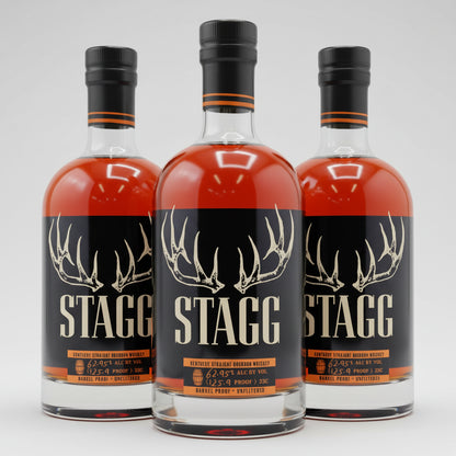 A bottle of Stagg Kentucky Straight Bourbon Whiskey on a plain white background. The bottle contains amber liquid and features a black label with a white antler graphic and the brand name 'STAGG' in bold white letters.