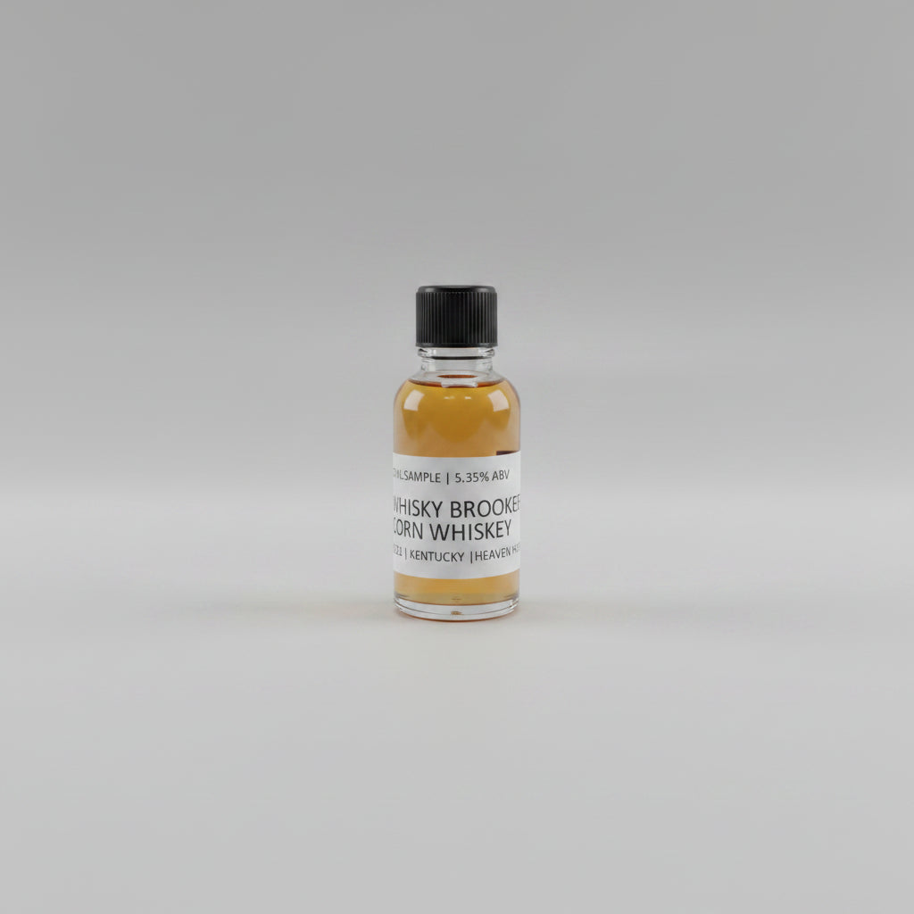 Small bottle of whisky Brooker corn whiskey with a label on a light background