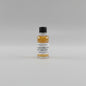 Small bottle of whisky Brooker corn whiskey with a label on a light background